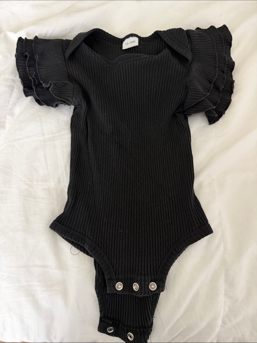 Quincy Mae Black Ribbed Ruffle Sleeve Bodysuit